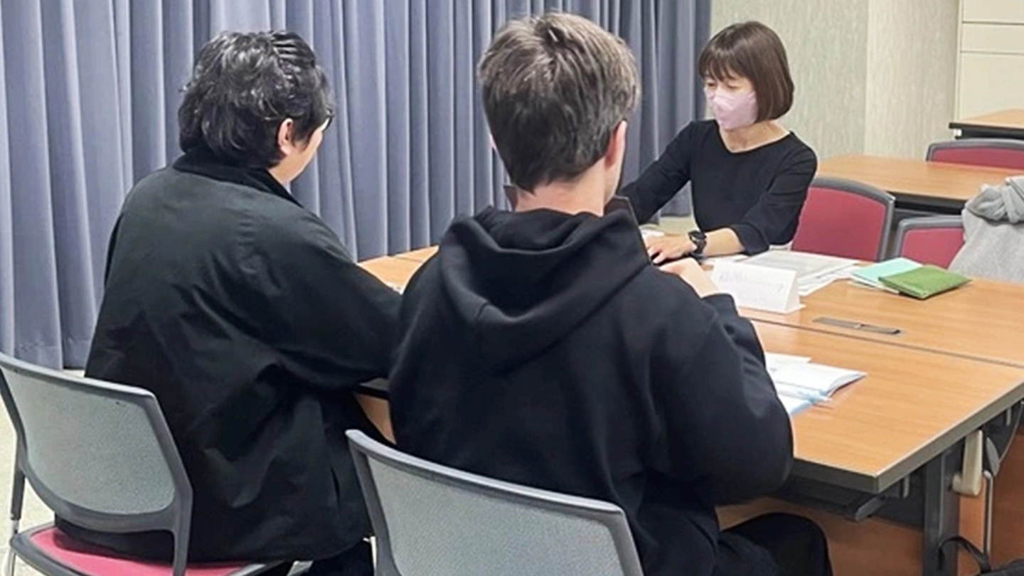 Students receiving practical advice through mock interviews
