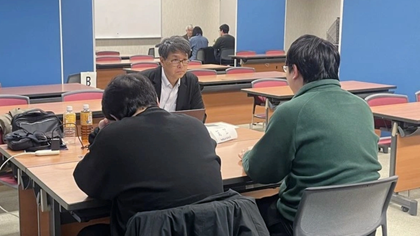 Students receiving practical advice through mock interviews